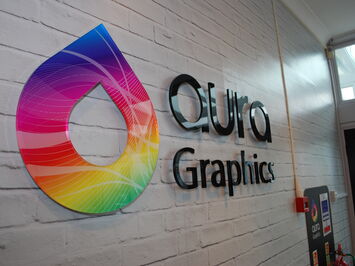Aura Brand Solutions 3D sign logo made from cut acrylic lettering & printed self-adhesive films