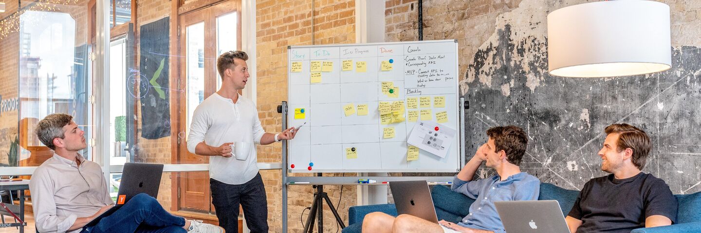 group of people meeting in office environment