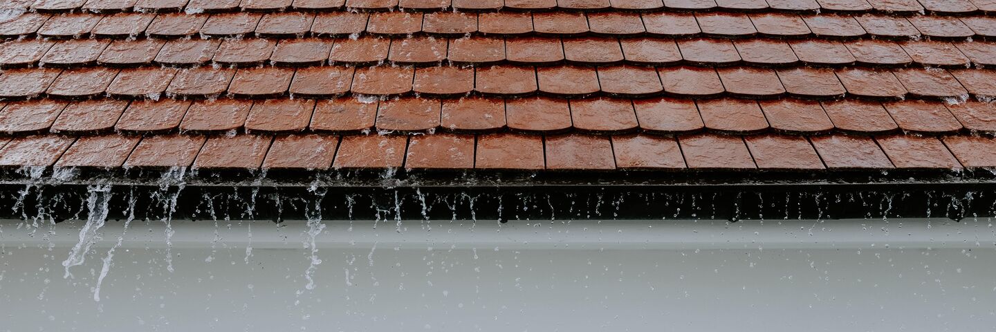 Rain falling off roof