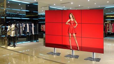Multiple Screen digital signage in clothing retail store