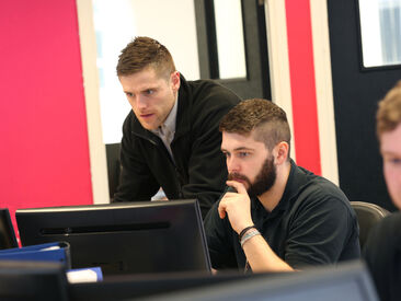 Aura brand implementation team working on brand project management