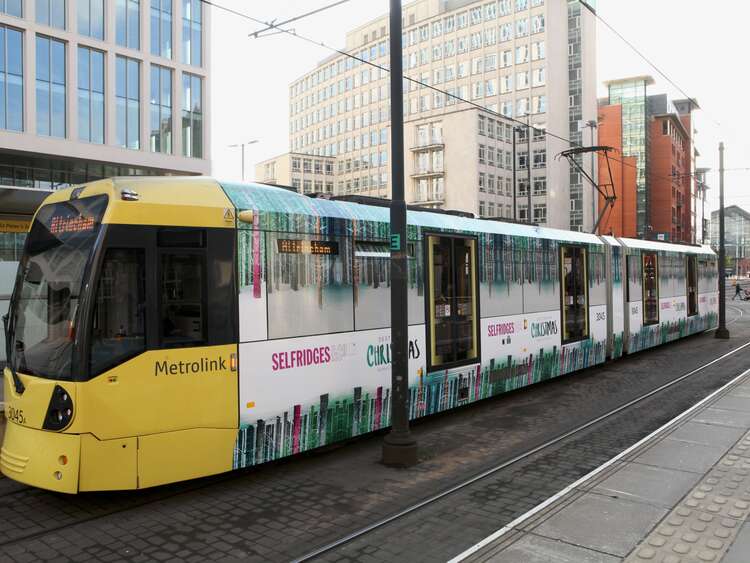 Festive wrap on Manchester Metrolink tram for Selfridges Christmas retail campaign