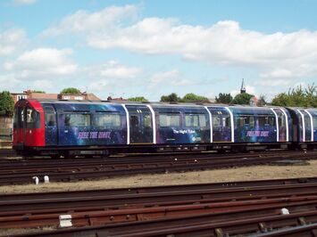 Night Tube promotional wrap on London Underground tube for TfL