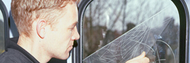 Window film removal on interior of carriage