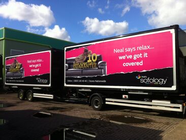 Truck advertising campaign banners for Sofology vehicle fleet