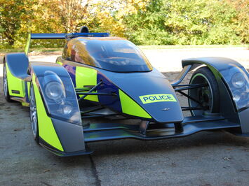 Reflective conspicuity livery in Police Battenburg on Caparo T1 sports car