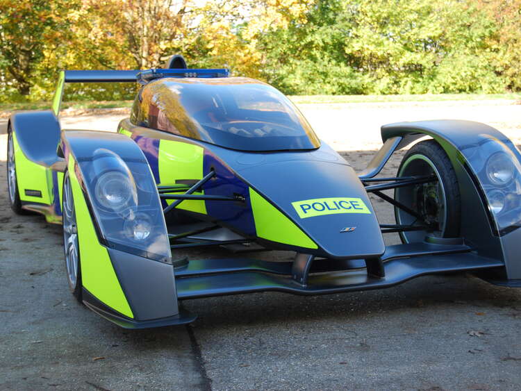 Reflective conspicuity livery in Police Battenburg on Caparo T1 sports car