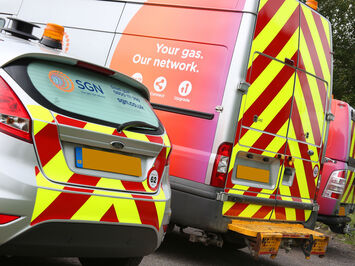 Rear of freshly branded SGN fleet car and van with Chapter 8 hi vis chevrons