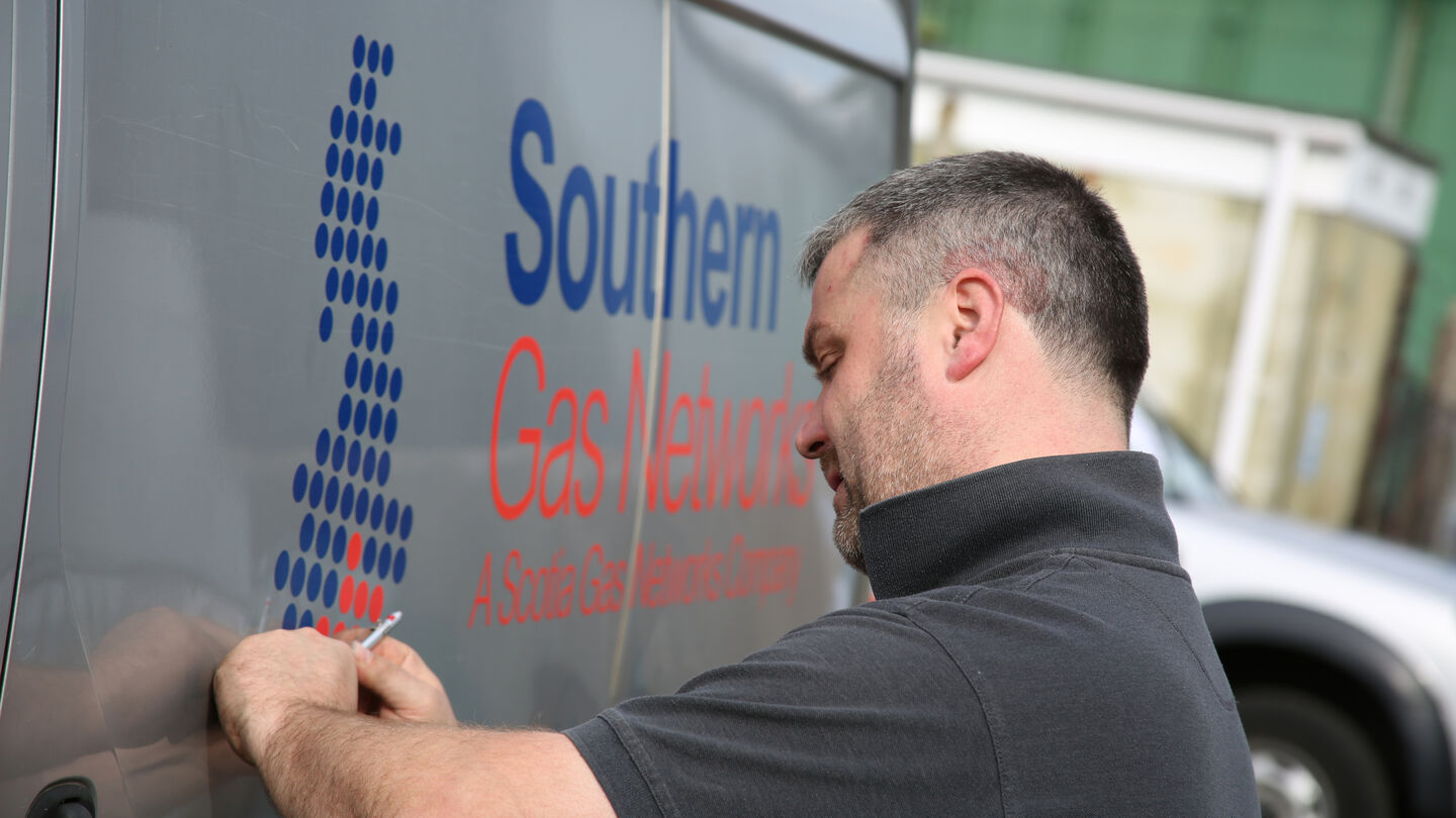Removing the old graphics from the fleet in preparation for SGN rebrand