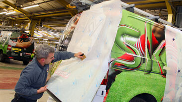 Installation of premium wrapping film for Sky van graphics