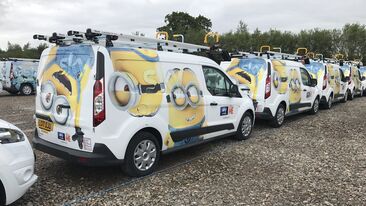 Sky van fleet wrapped in Minions Movie livery for promotional campaign