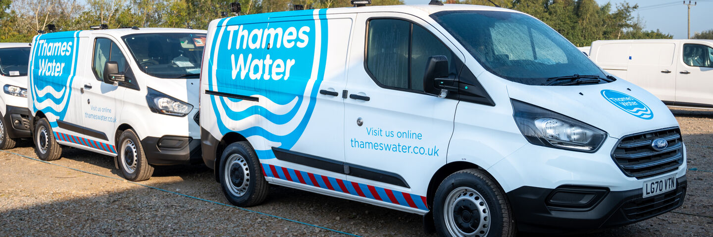 Thames Water and their freshly wrapped fleet parked outside