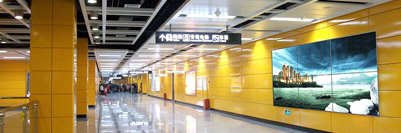 Hallway tunnel multiple digital signage screen on wall