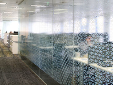 HSBC Glass Manifestation using geometric pattern printed to clear film in white ink