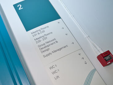 Custom branded floor directory & way finding sing system in office interiors