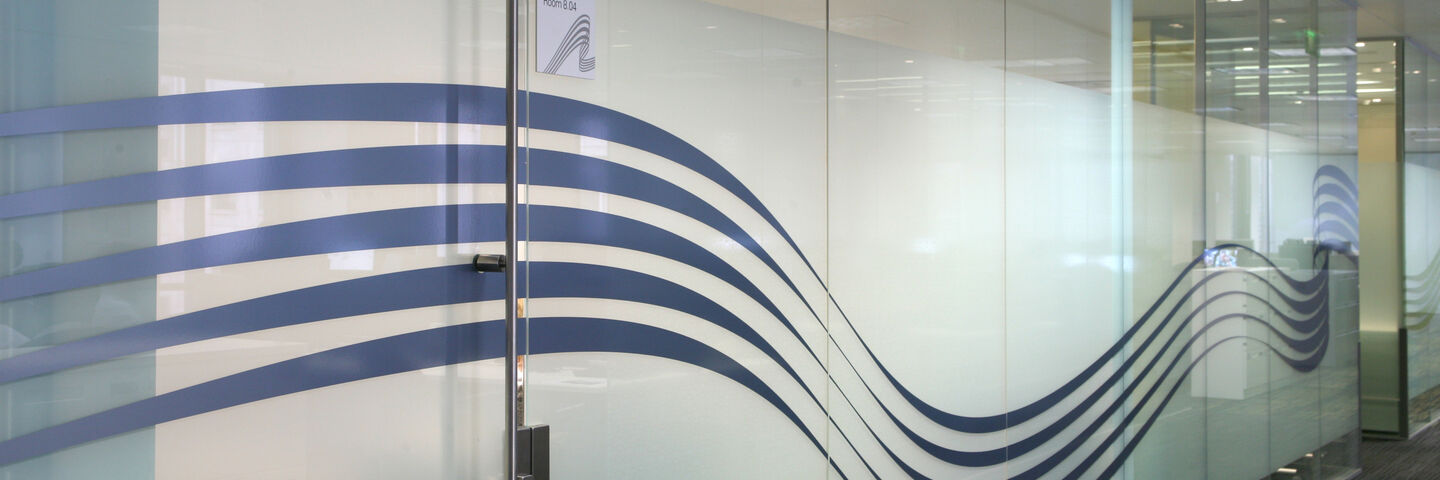 Flowing design on a frosted glass wall