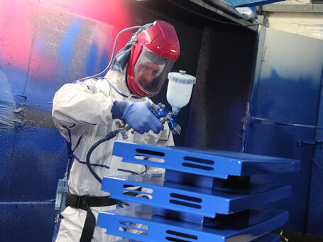 Paint respray as part of panel refurbishment project for Esso petrol pumps