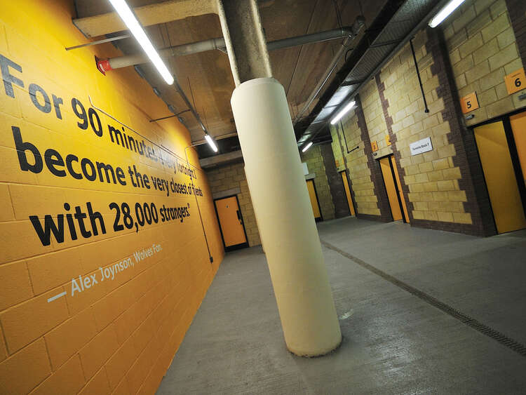 Printed graphics using special textured wall film for brick walls at Wolves FC stadium