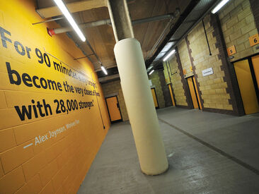 Printed graphics using special textured wall film for brick walls at Wolves FC stadium