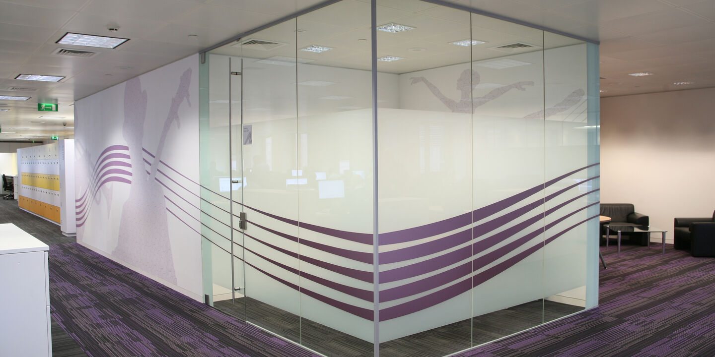 Interior graphics for walls and glass used for premium office workplace branding